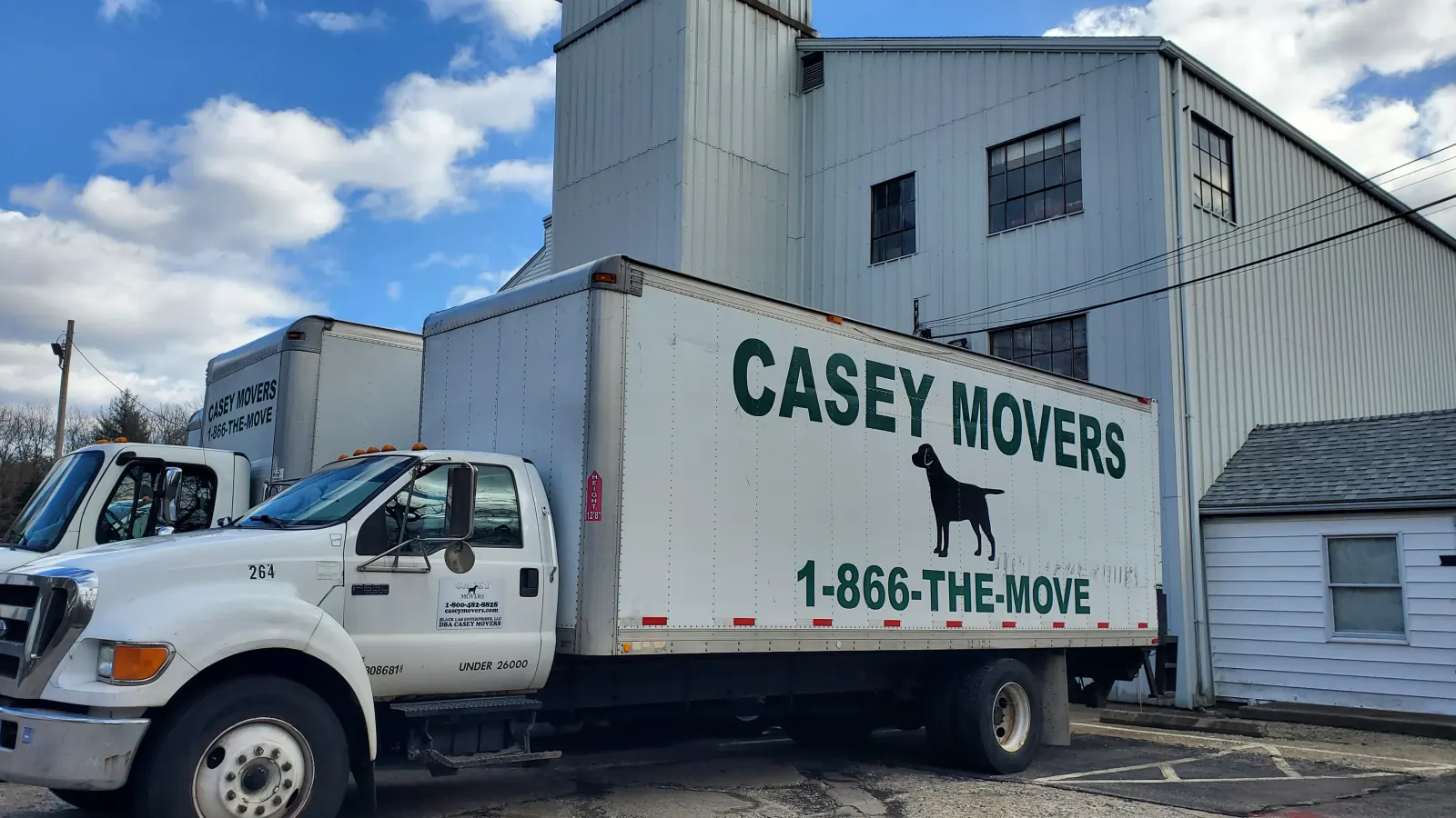 Casey Movers box trucks parked at the Hanover warehouse, 1-866-THE-MOVE on the door